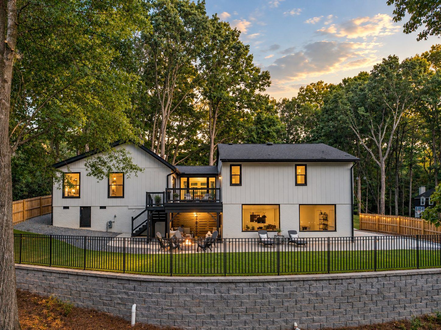 Completed whole-home renovation with finished rear exterior and outdoor living area